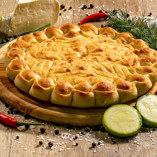 Осетинские пироги с курицей, сыром и кабачком